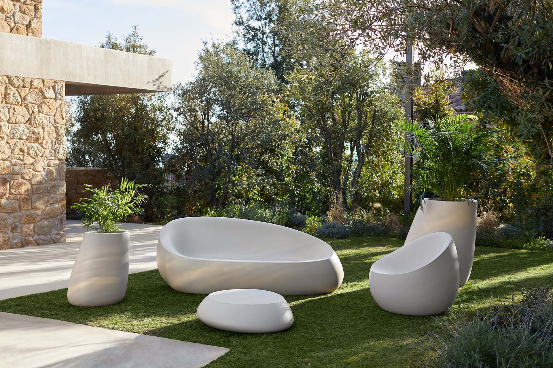 Stones outdoor sofa, armchair, table and planters by Stefano Giovannoni & Elisa Cargan Vondom